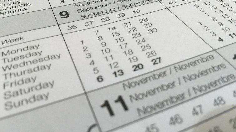 A close-up of a printed monthly calendar page showing the numbered days of the week.