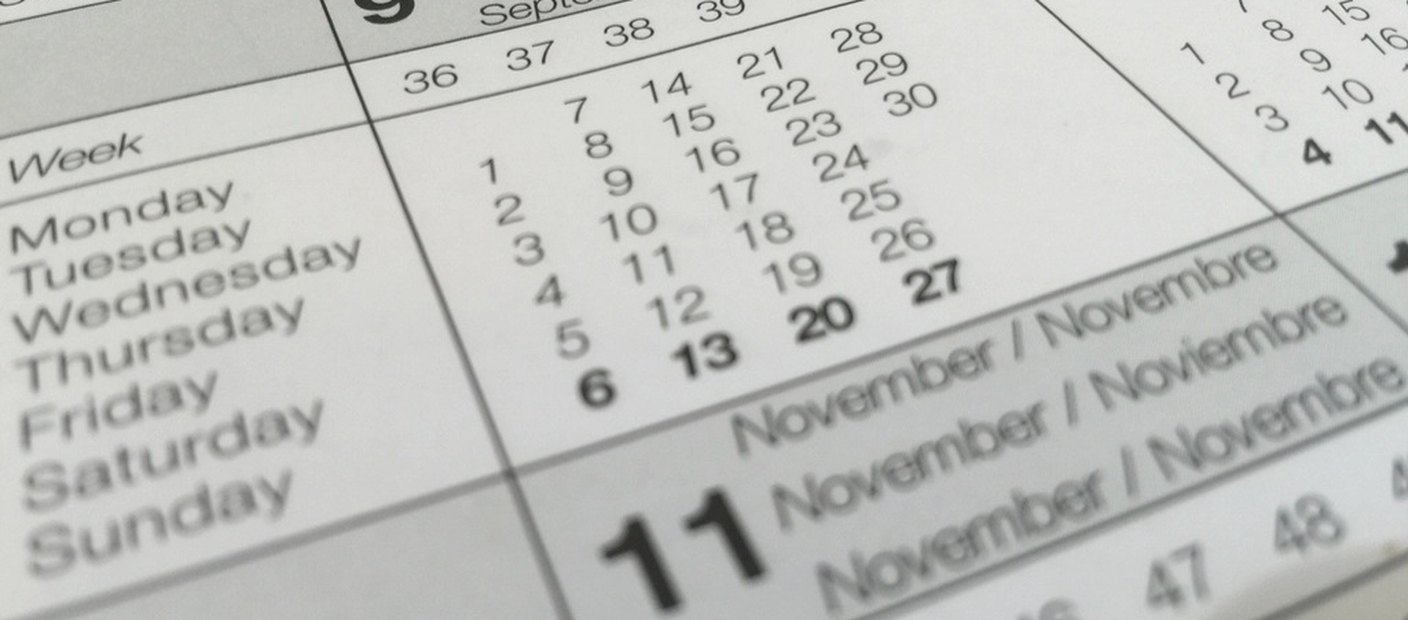 A close-up of a printed monthly calendar page showing the numbered days of the week.